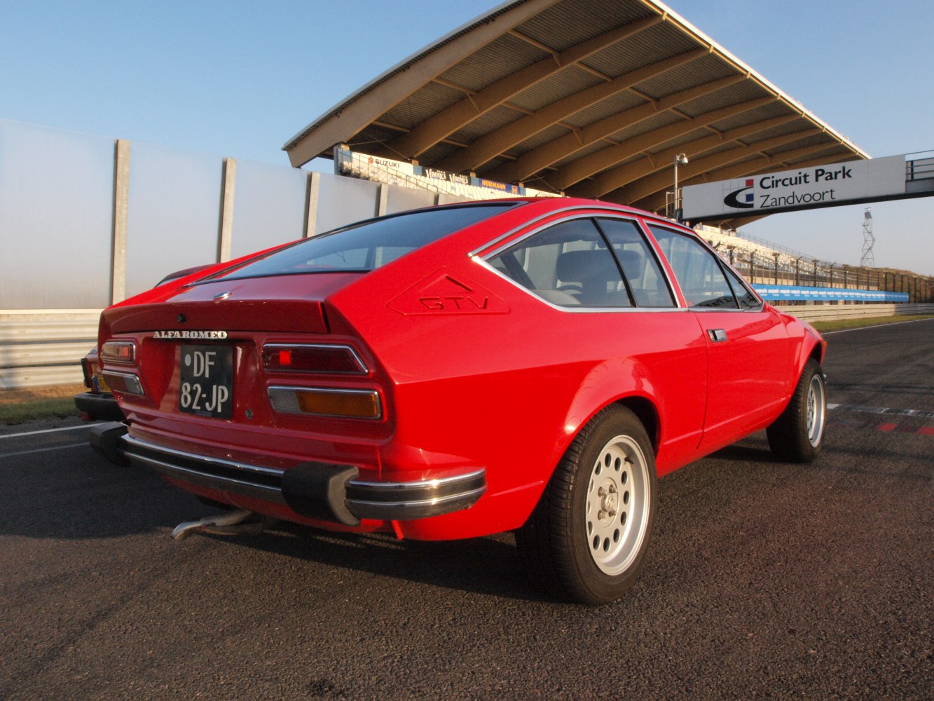 Red fastback coupe with GTV badge and distinctive rear design