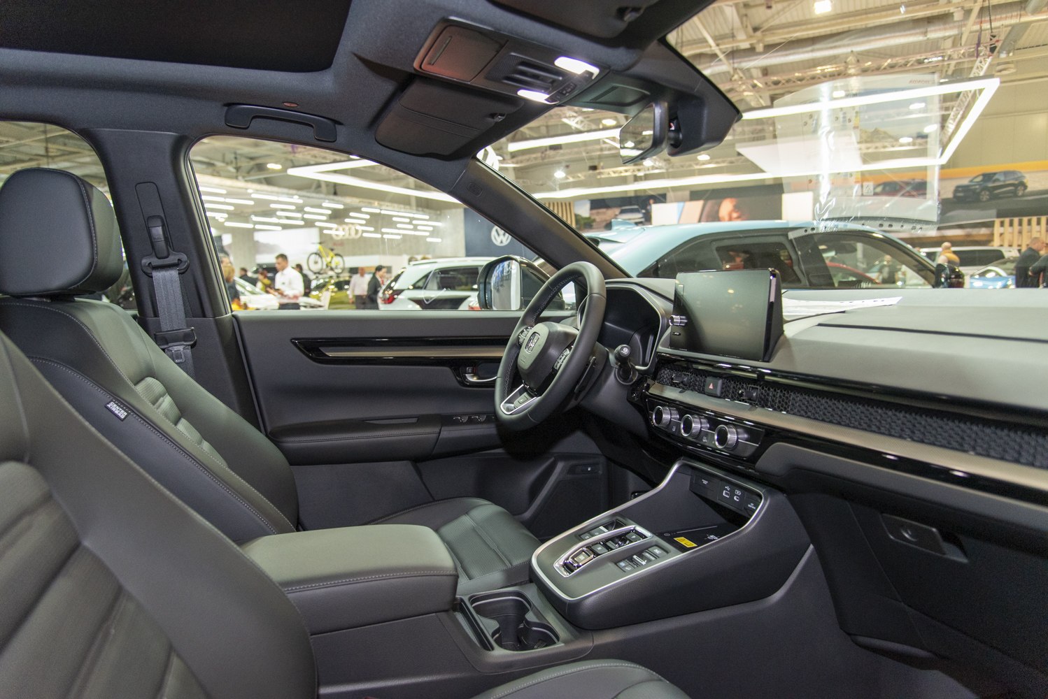 Modern car interior with digital dashboard and ergonomic seating