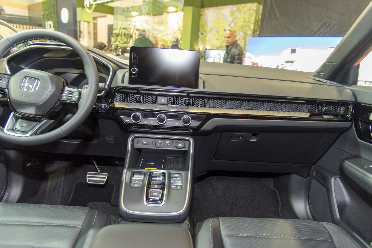 Modern car interior dashboard and center console with digital display and controls