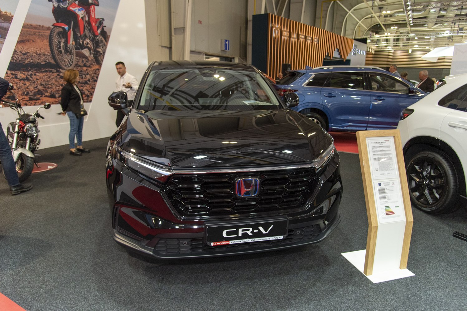Sleek black SUV front with distinctive grille and modern headlights