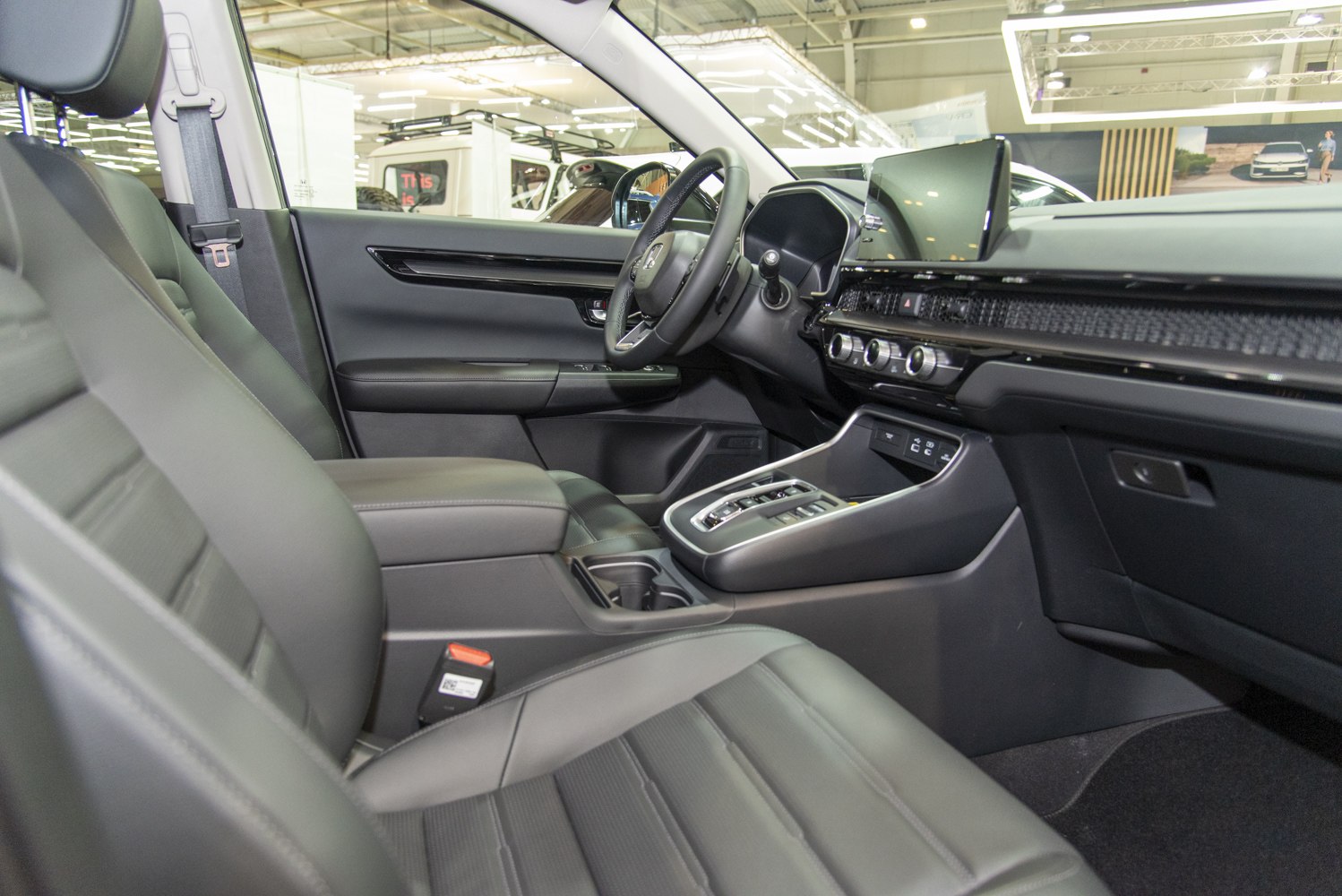 Modern car interior with digital dashboard and ergonomic front seats