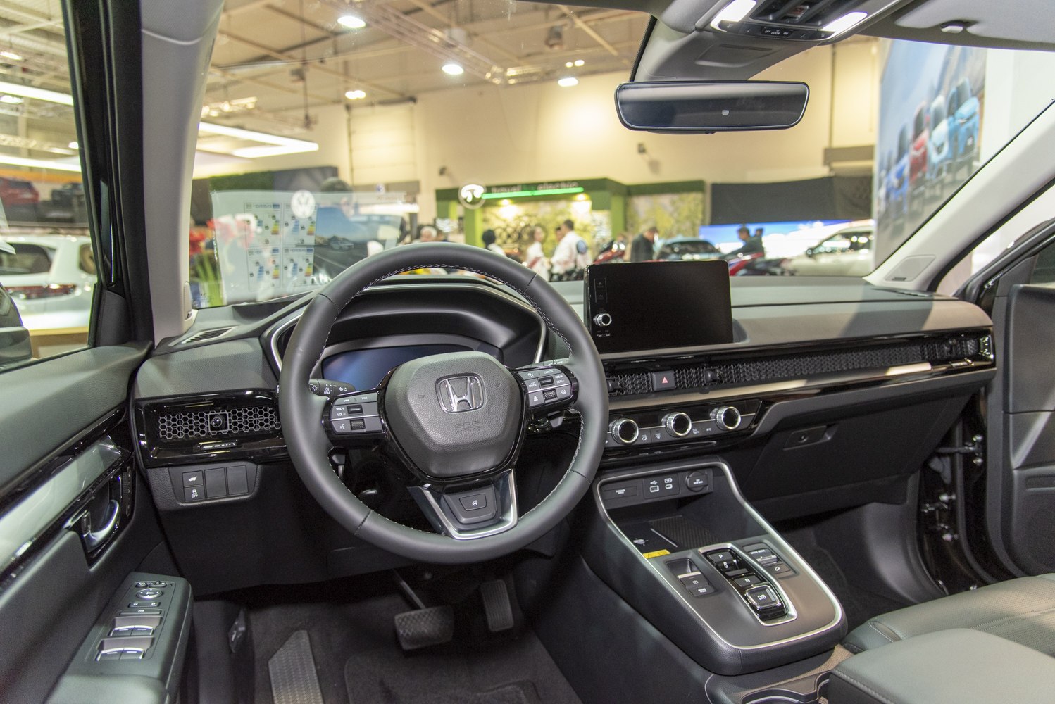 Modern car interior with digital dashboard and multifunction steering wheel