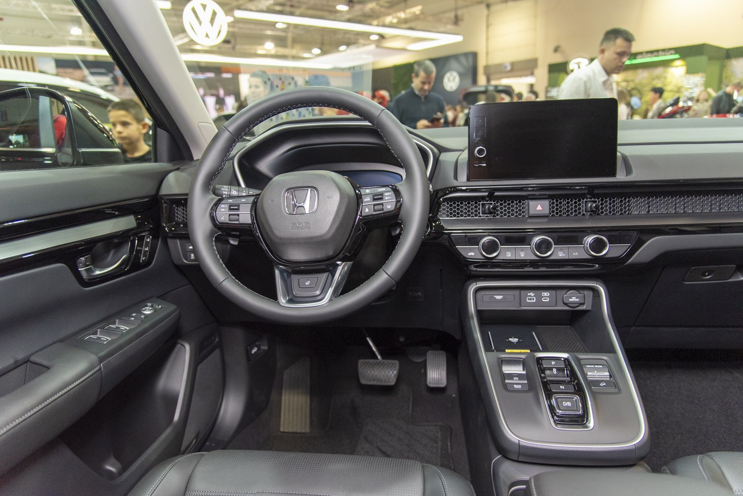Modern car interior with digital dashboard and multifunction steering wheel