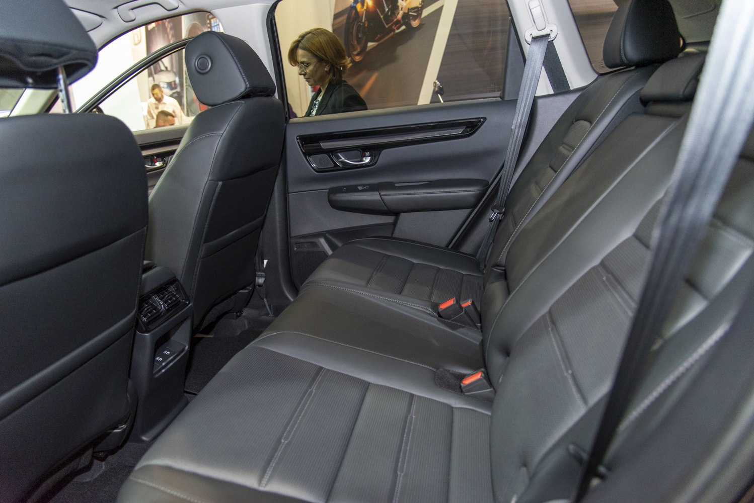 Spacious rear seating with black upholstery and headrests