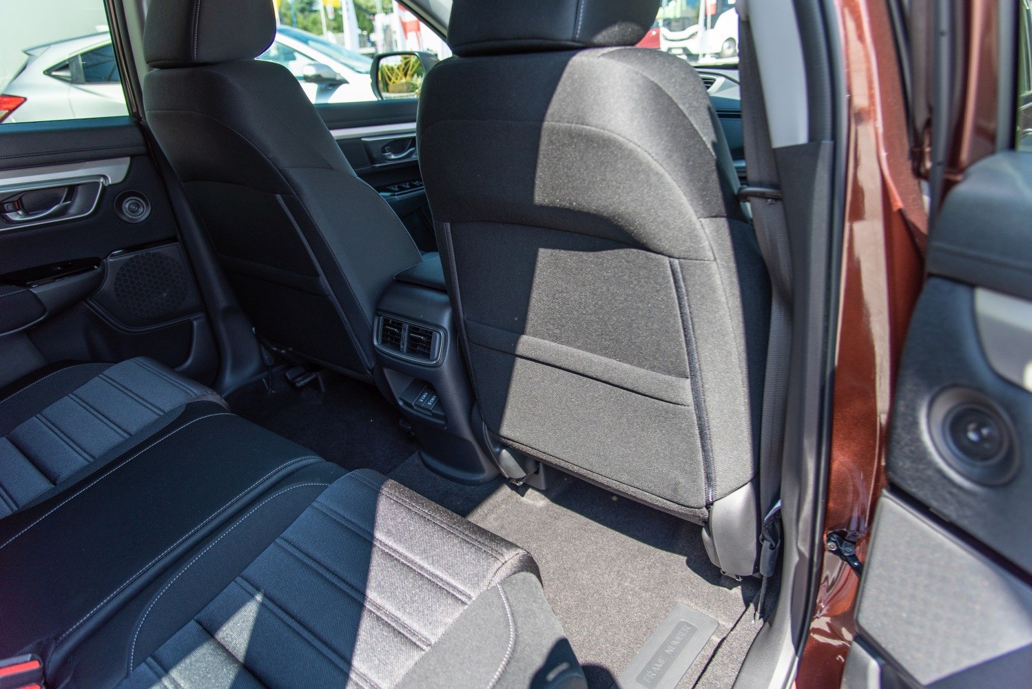 Rear seating area with fabric seats and rear ventilation vents