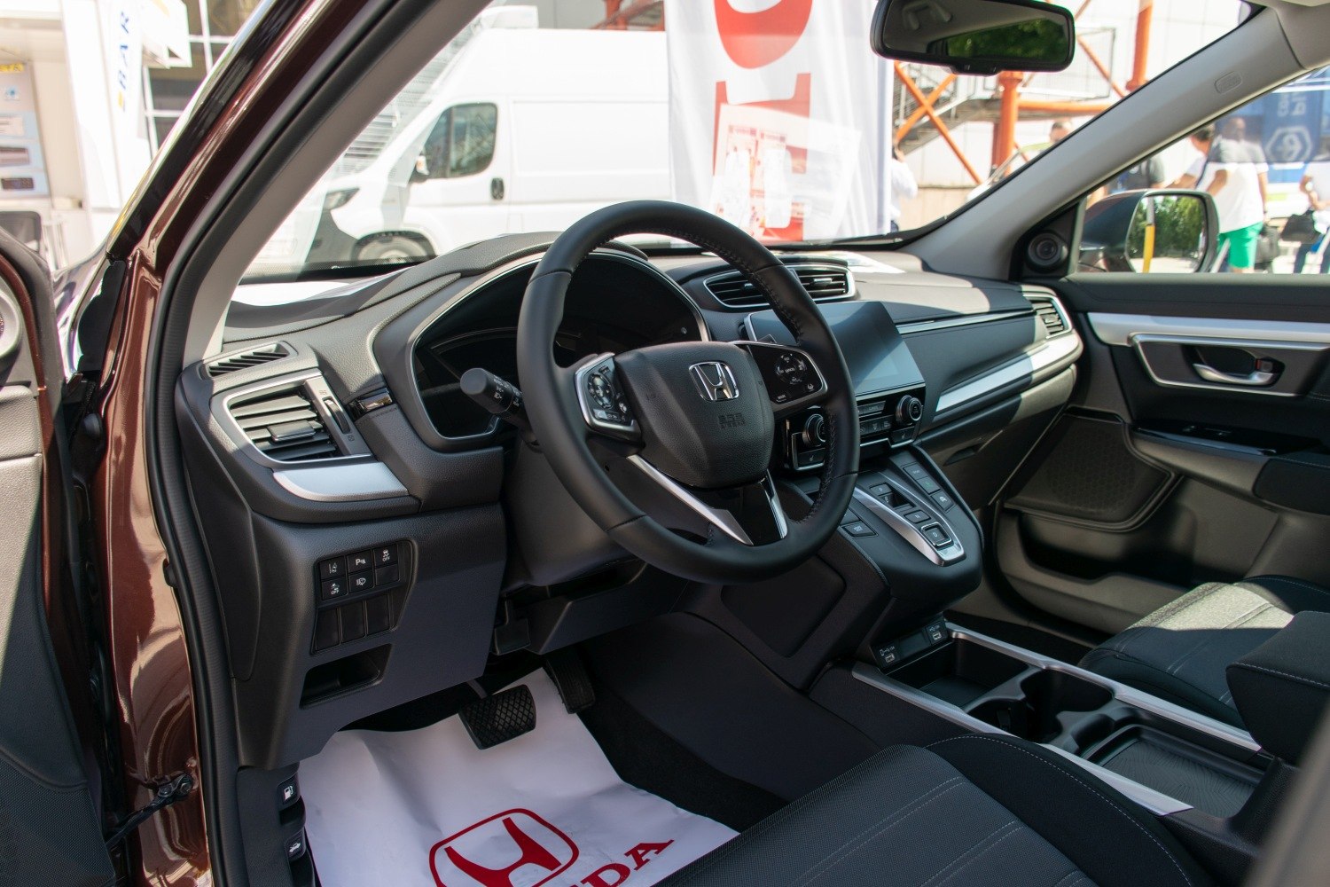 Interior dashboard and steering wheel with modern infotainment