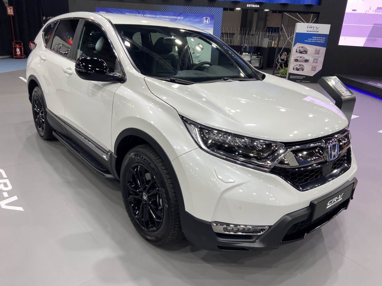 Front and side view with black alloy wheels and LED headlights