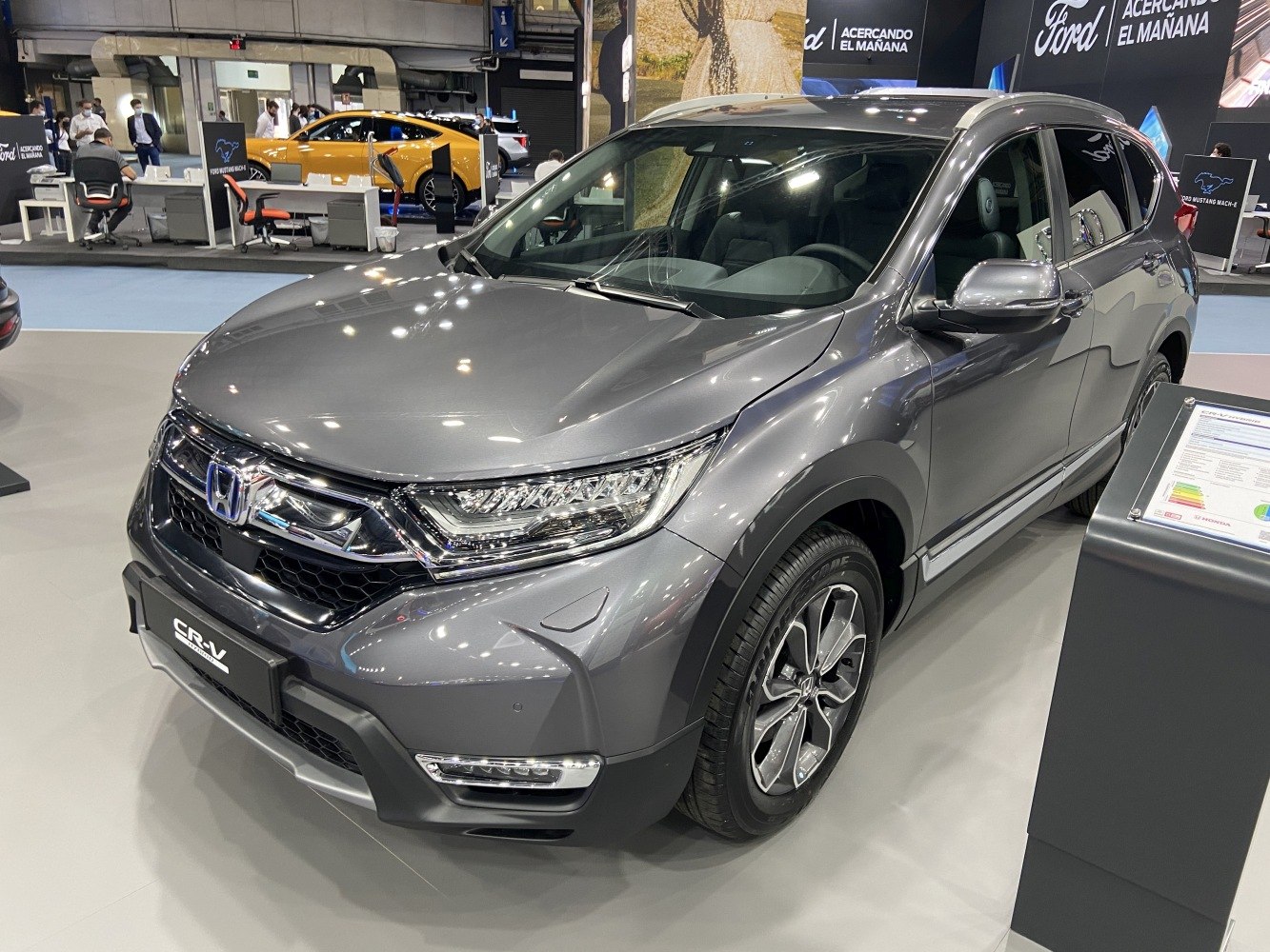 Front view of metallic gray SUV with LED headlights and alloy wheels