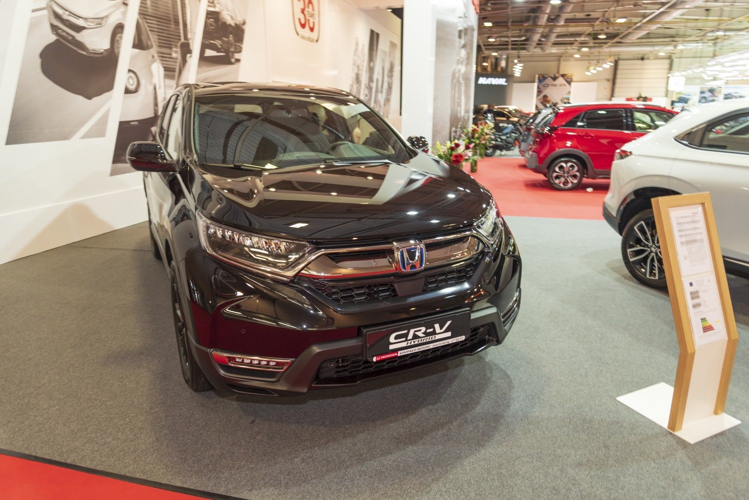 Front view of a black SUV with LED headlights and detailed grille.