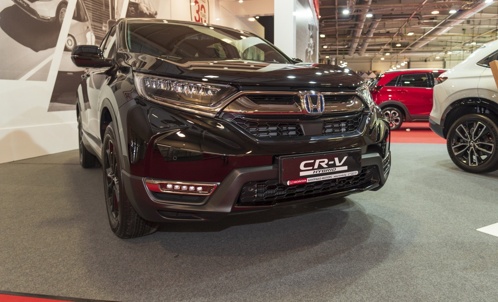 Front view with LED headlights and grille of a modern SUV