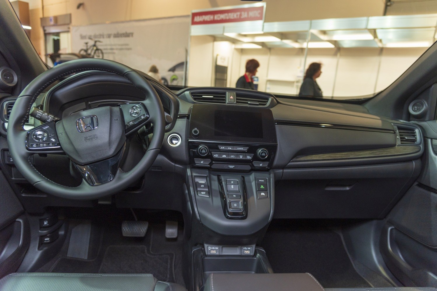 Dashboard, steering wheel, and central console of a modern vehicle interior