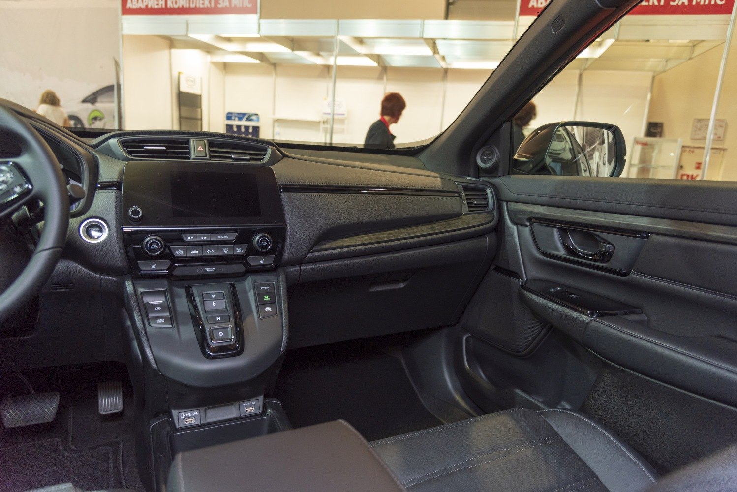 Modern dashboard and push-button gear selector interior