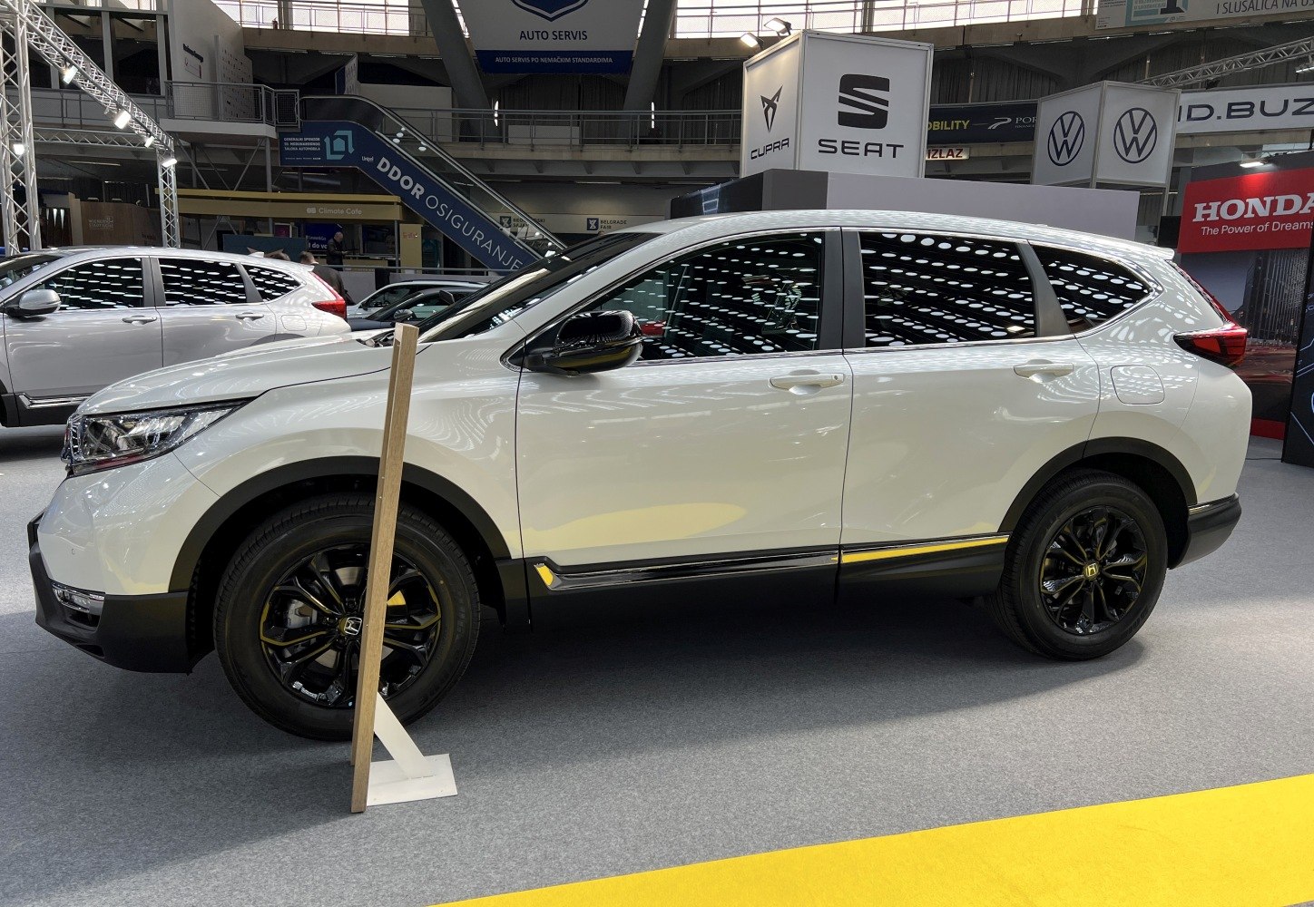 Side profile of SUV with sleek design and black alloy wheels