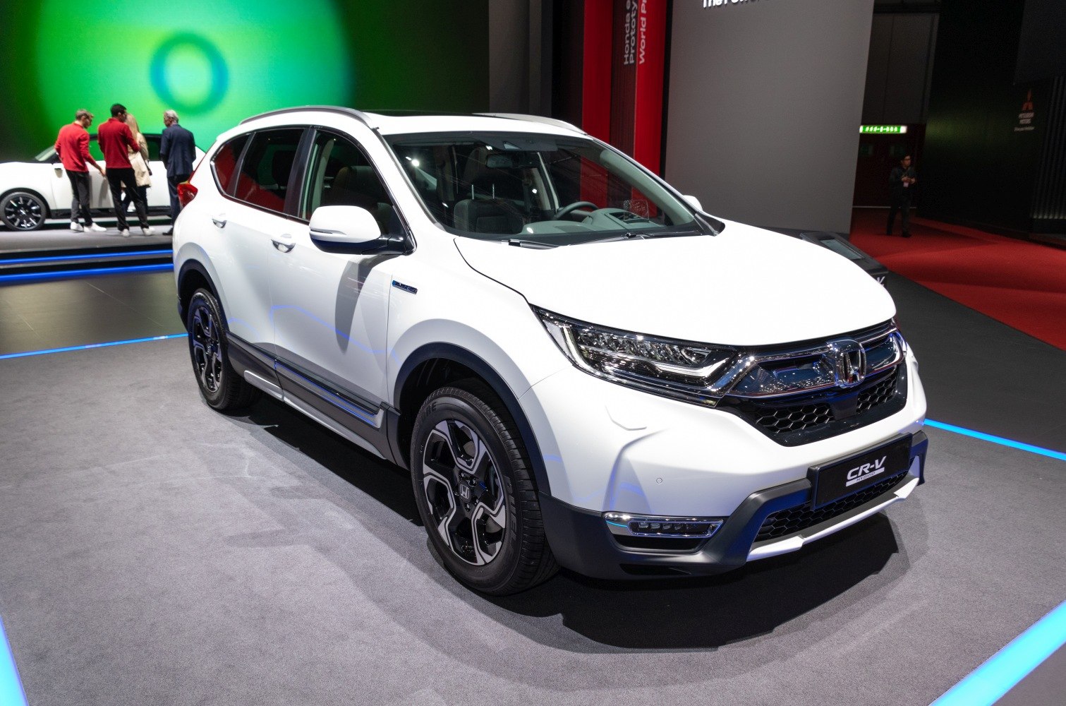 White SUV with intricate LED headlights and modern alloy wheels