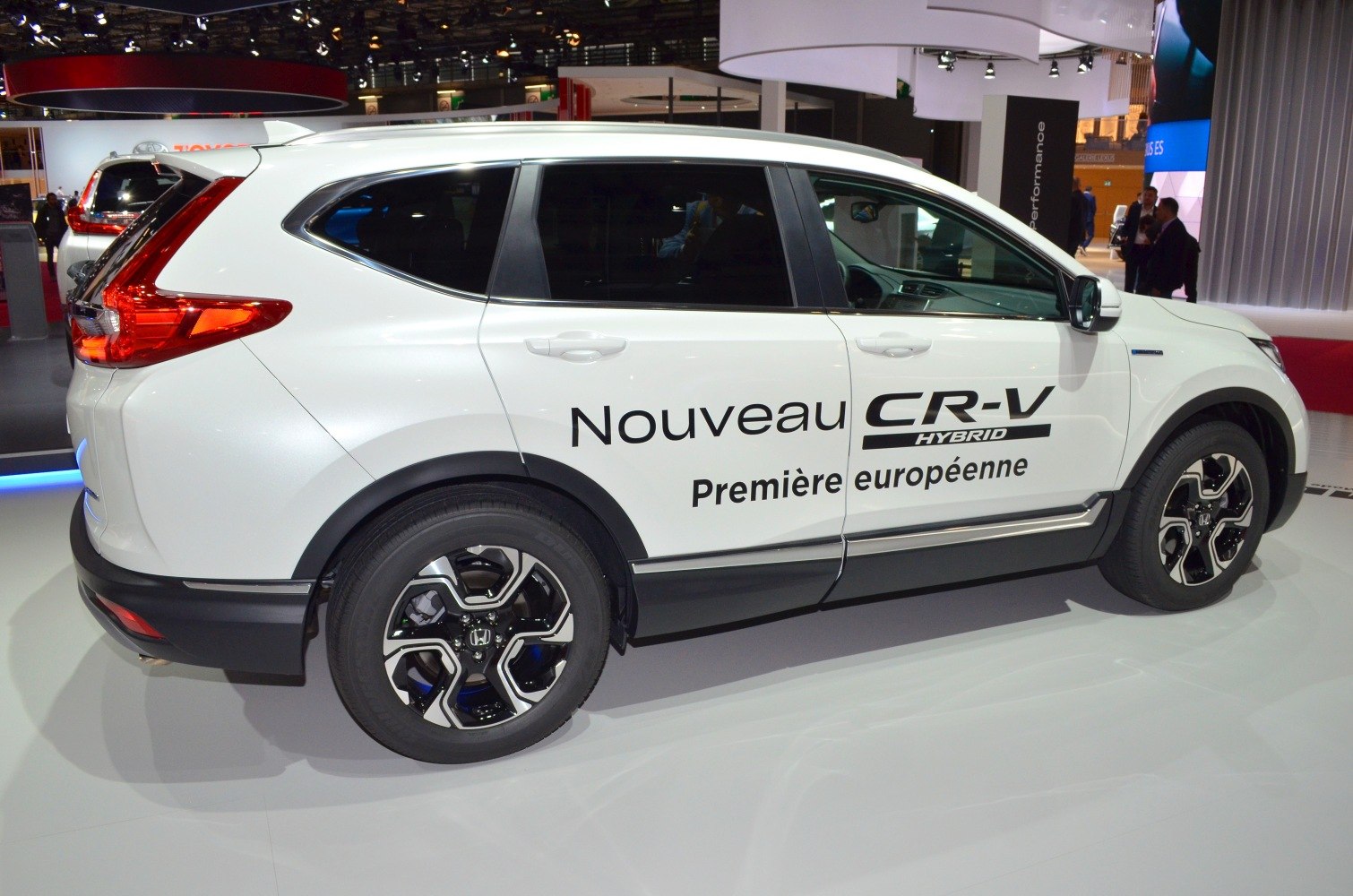 Side profile of hybrid SUV with alloy wheels and aerodynamic lines
