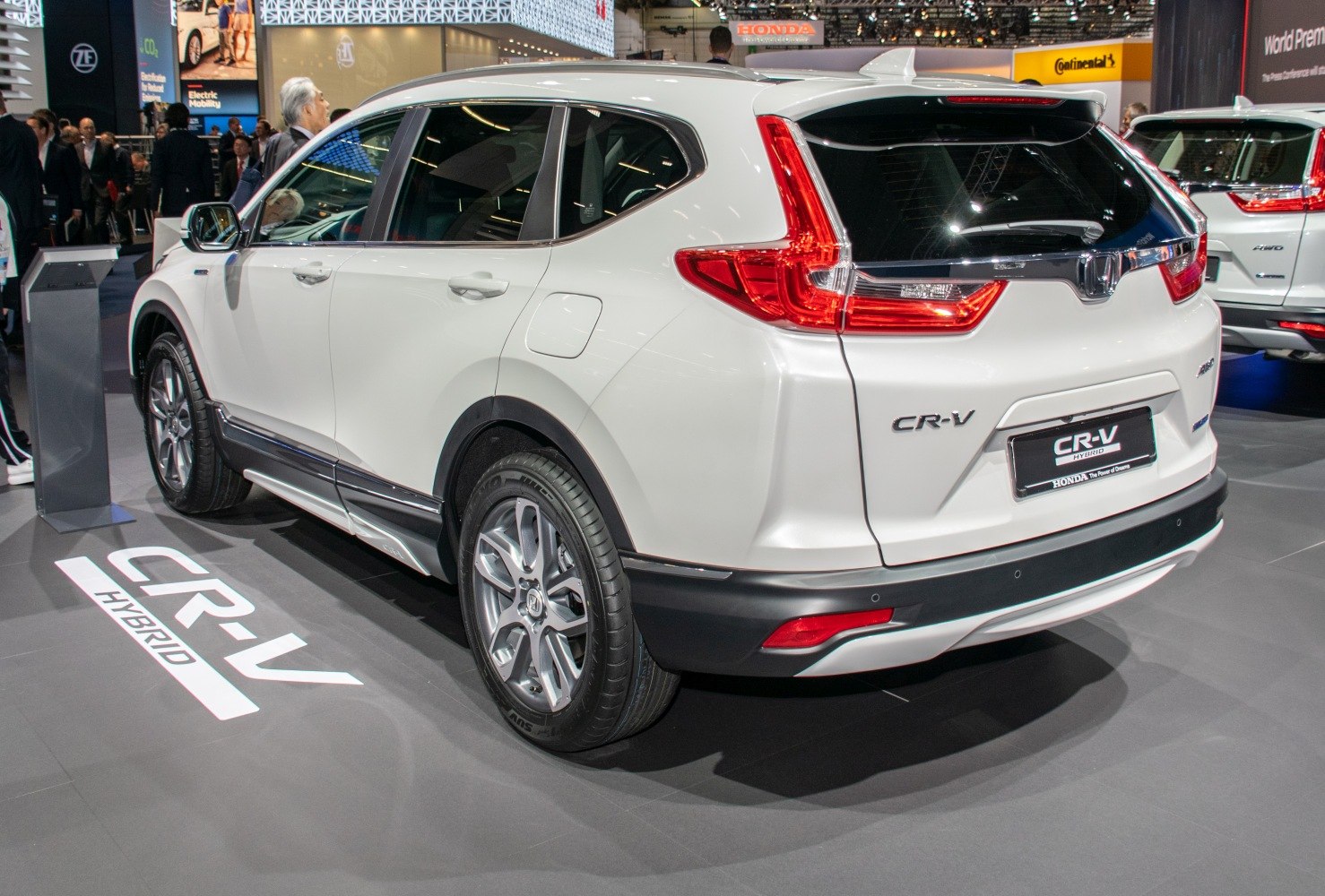 Rear and side view of a hybrid SUV with distinctive taillights and alloy wheels