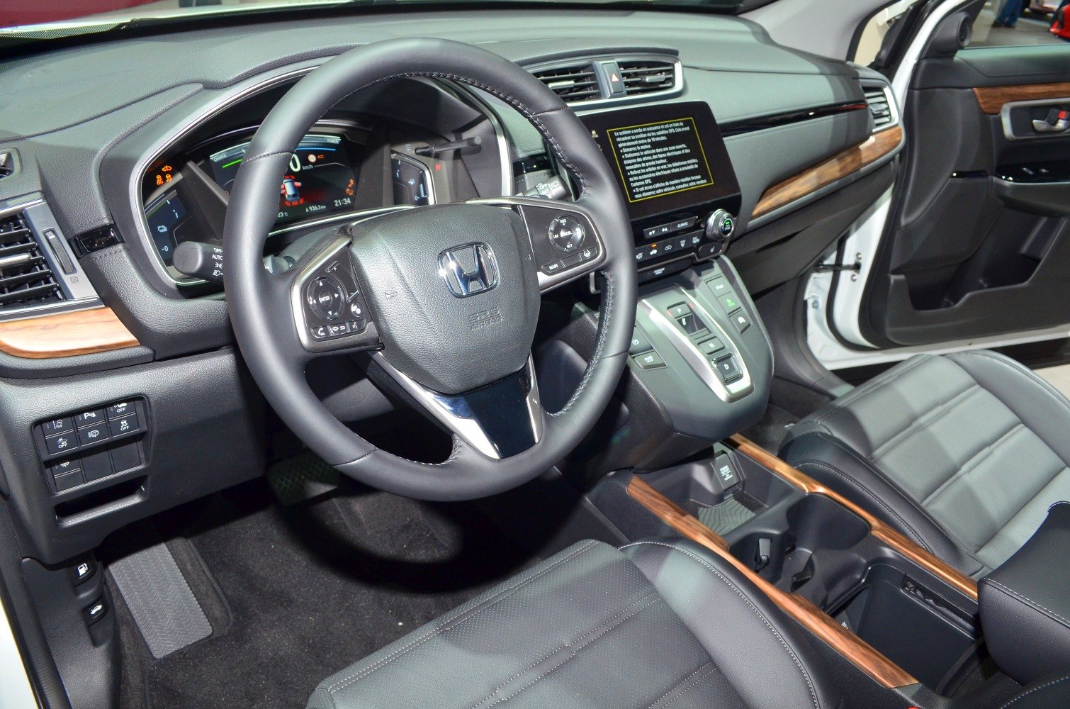 Digital dashboard with multifunction steering wheel and advanced console controls