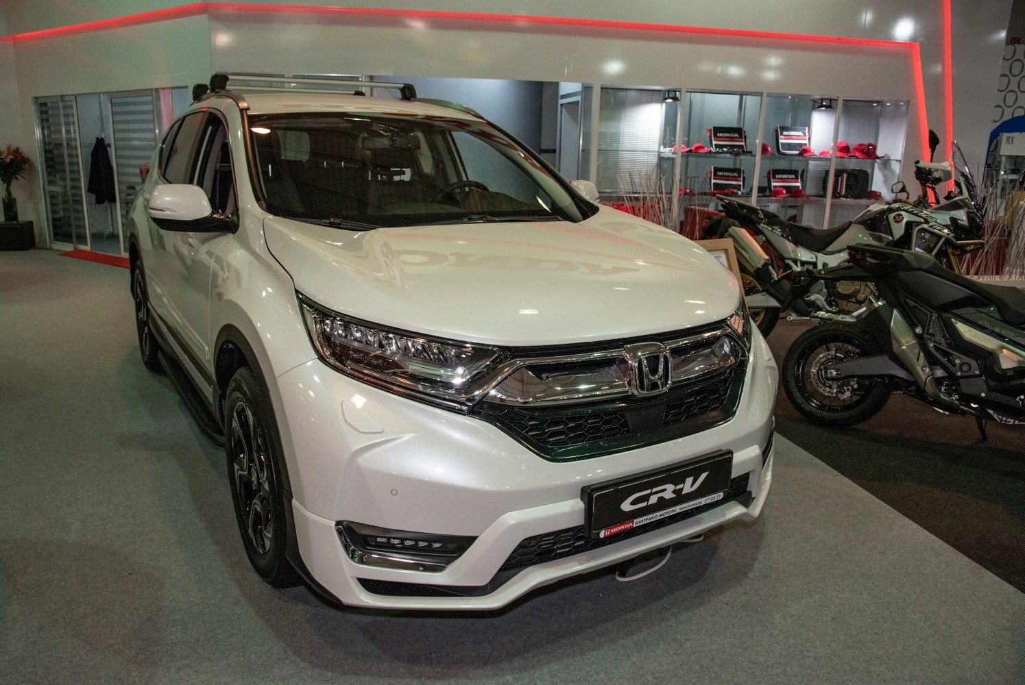 Front view of SUV with LED headlights and chrome grille
