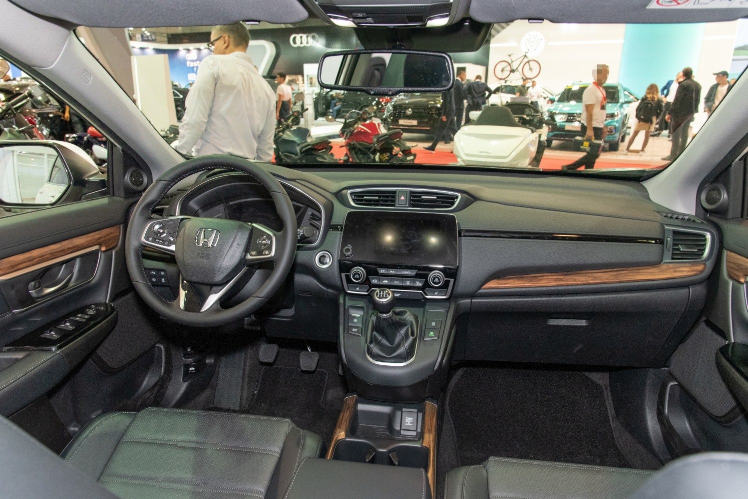 Modern car interior with touchscreen and manual gear shift