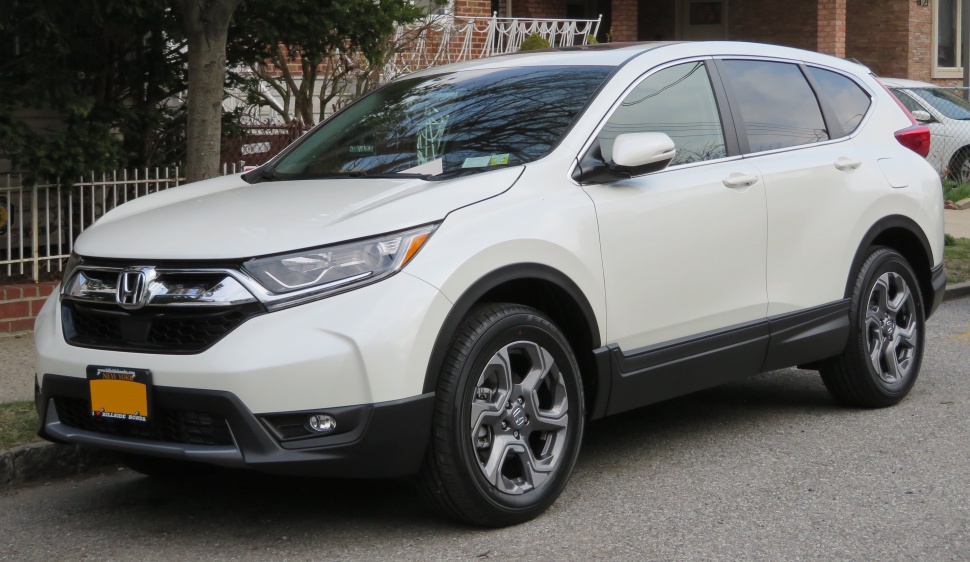 Front side profile of SUV with LED headlights and alloy wheels