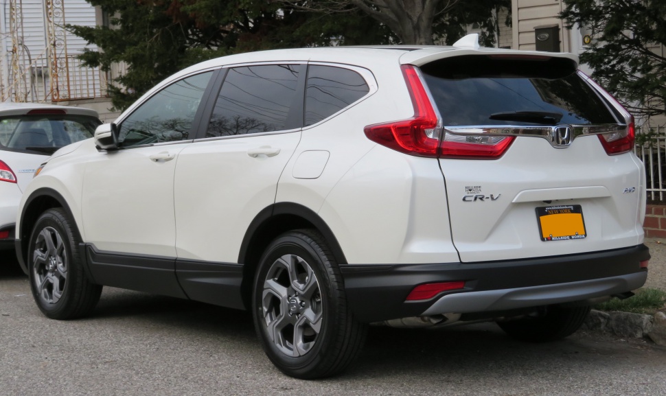 Rear and side view of a modern SUV with distinctive taillights and sleek design.