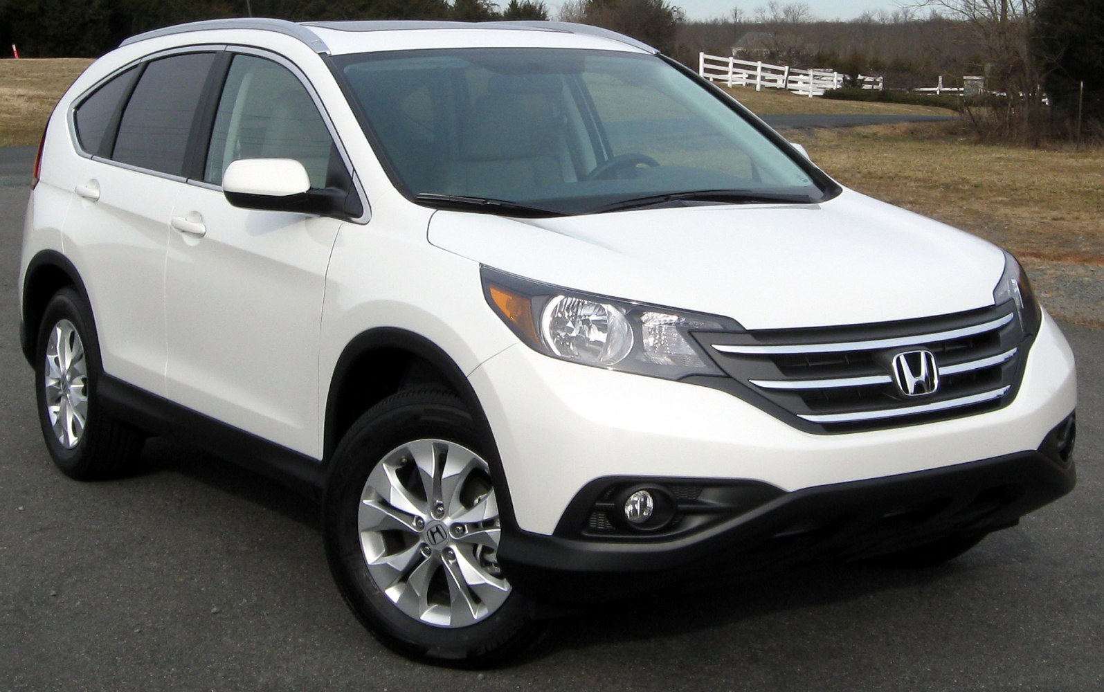 White compact SUV with alloy wheels and fog lights