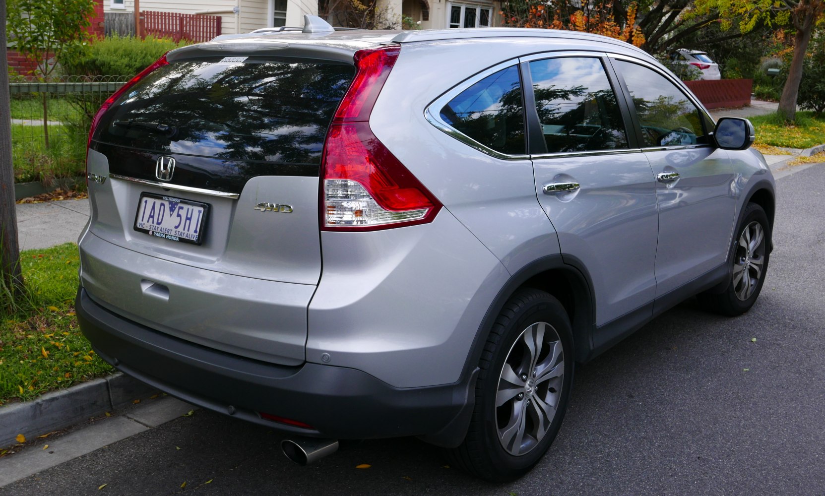 Silver SUV showing rear-side profile with LED tail lights and alloy wheels