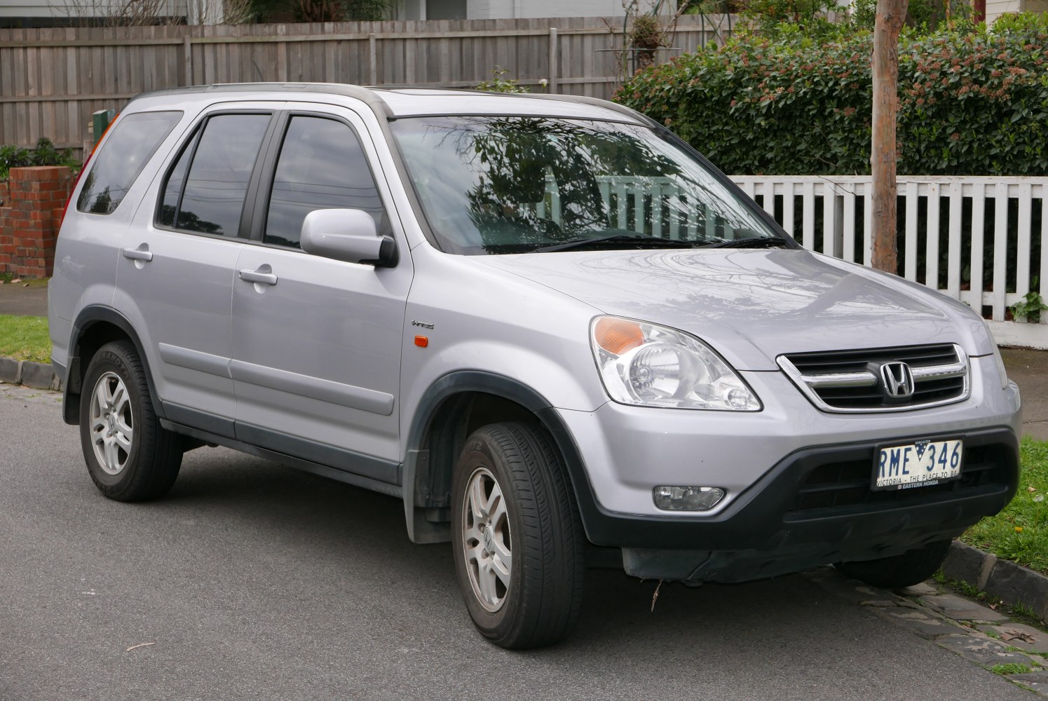 Silver compact SUV front three-quarter view with alloy wheels and prominent headlights