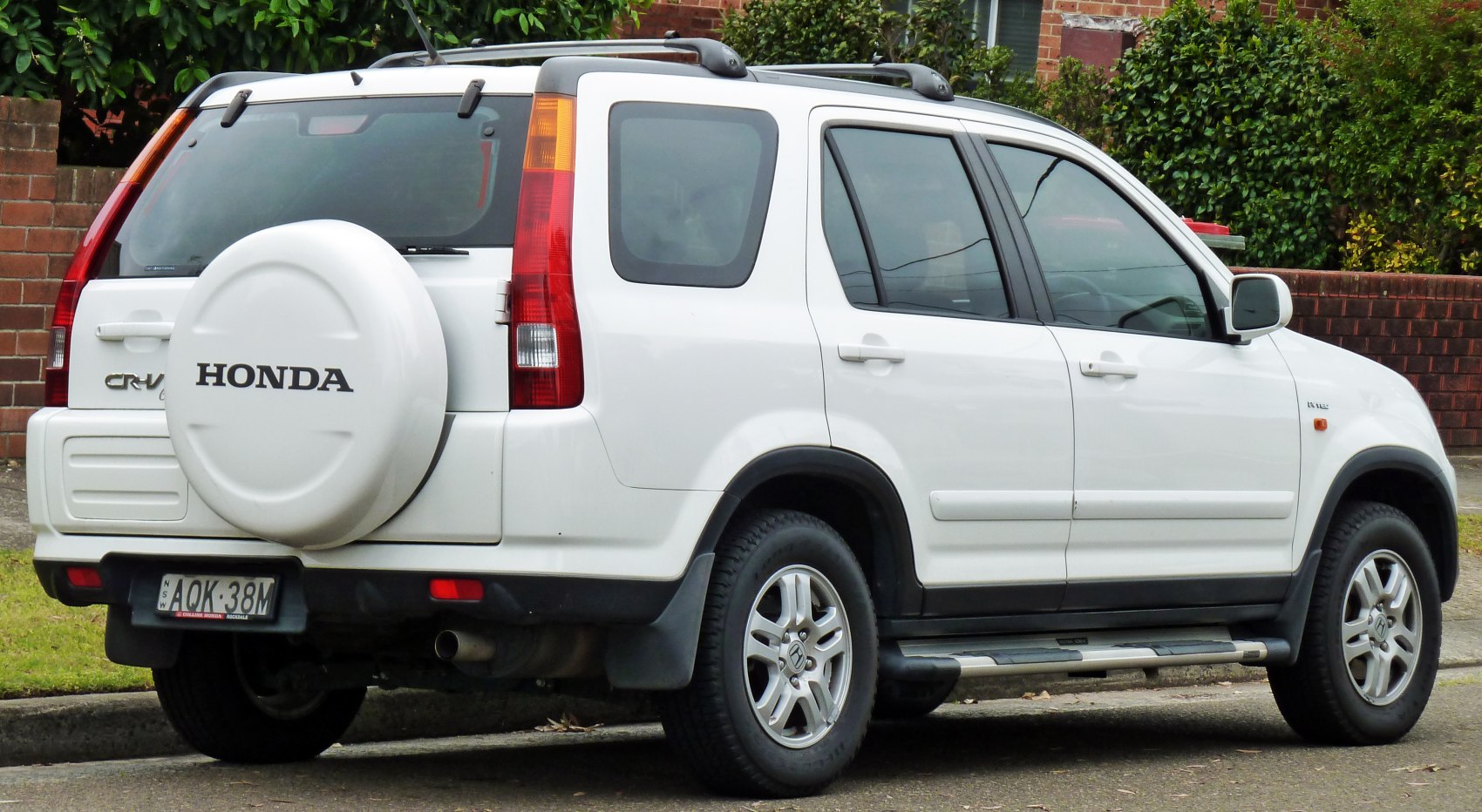 Rear and side view with spare tire cover and roof rails