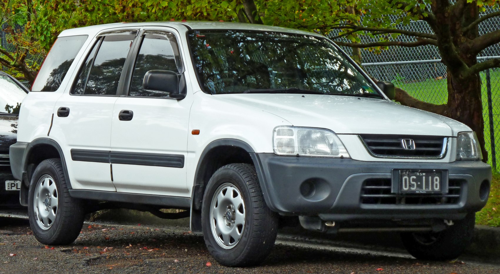 Compact SUV front side profile with rugged 90s design elements