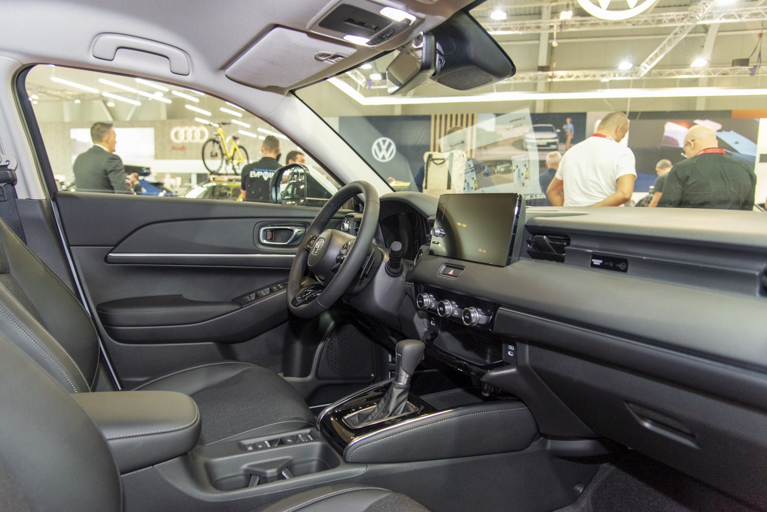 Modern car interior with central touchscreen and automatic gear shift