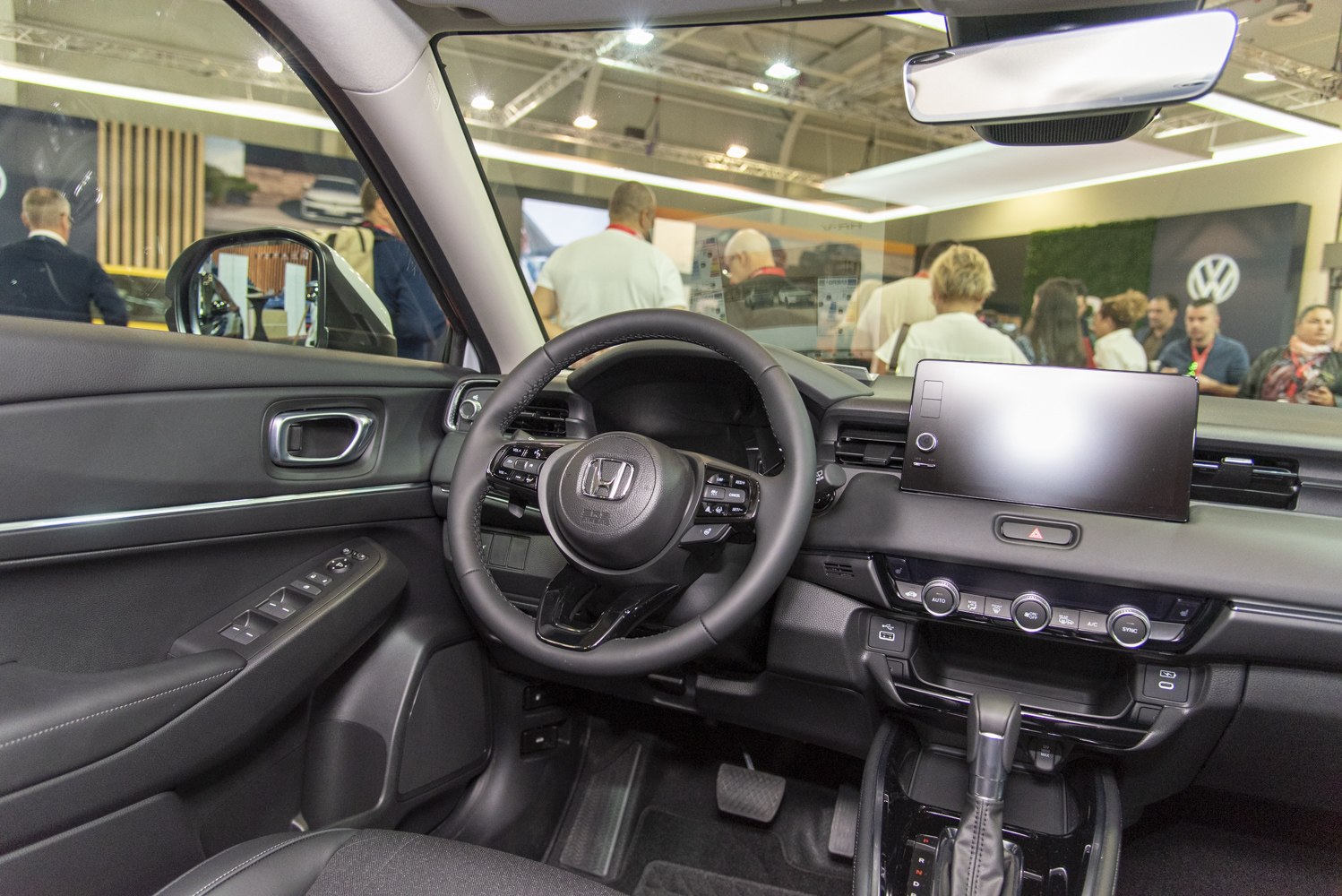 Sophisticated car interior with touchscreen and multifunction steering wheel