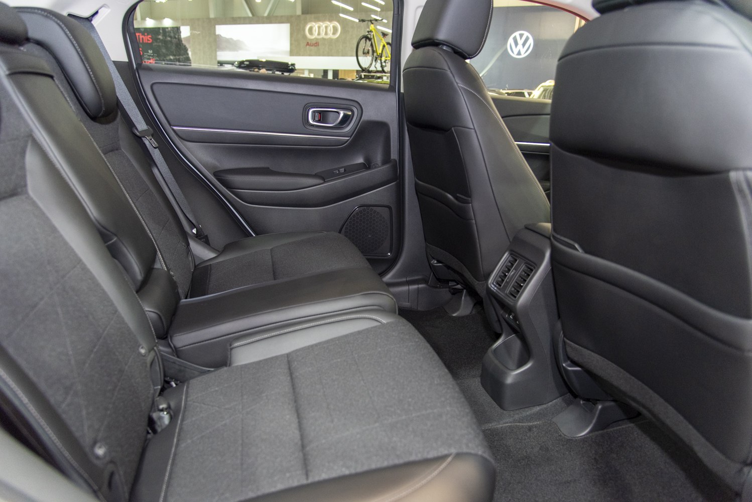 Spacious rear seats with rear ventilation and modern upholstery.