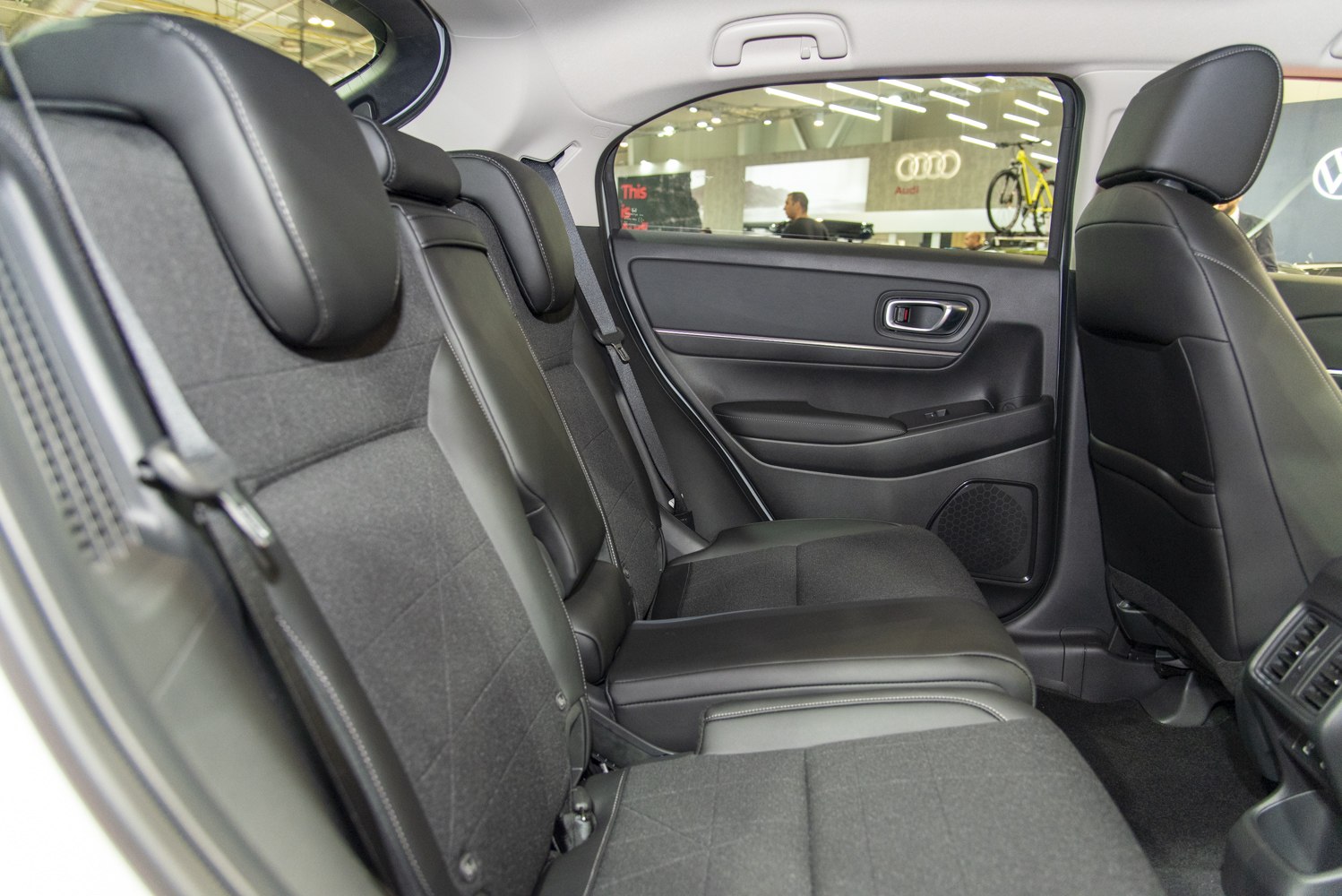 Rear seat interior with black upholstery and modern design
