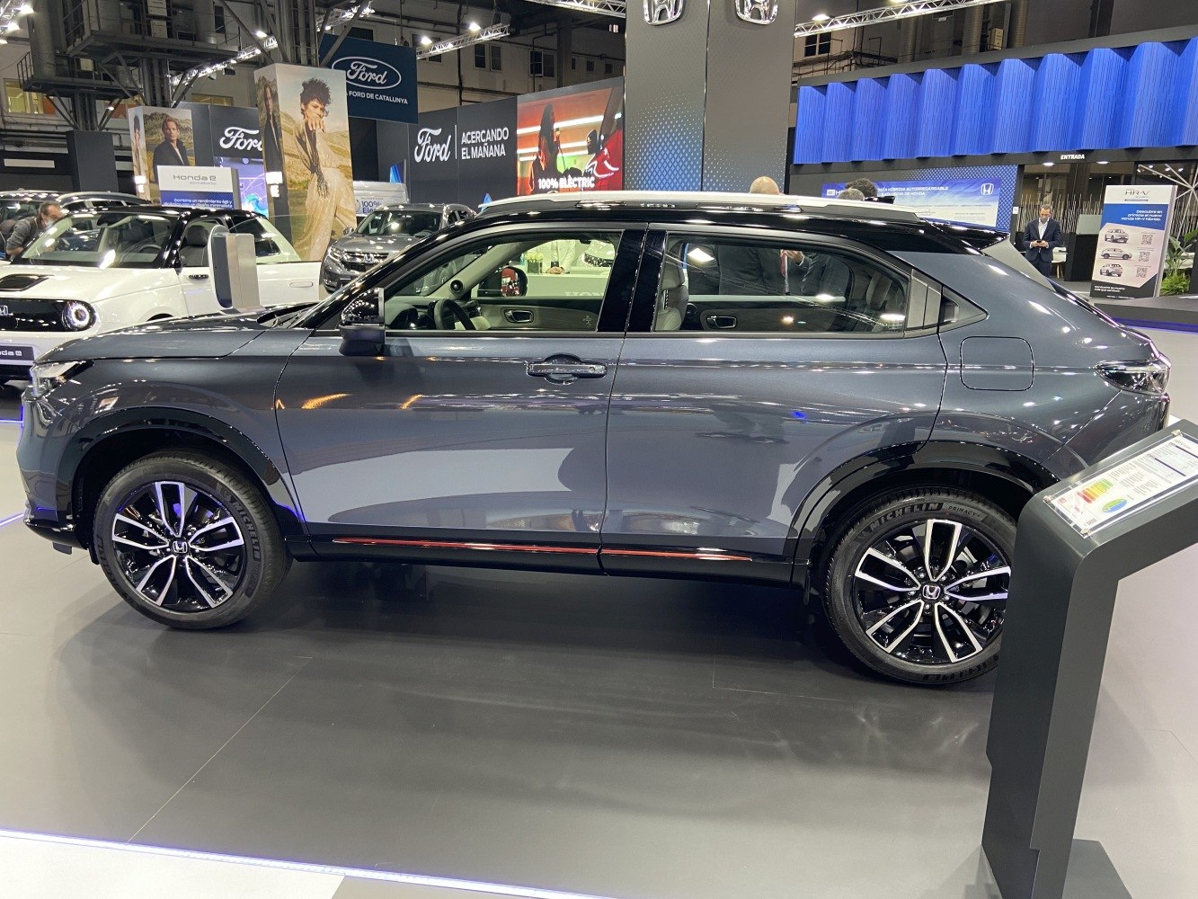 Side profile of SUV with black multi-spoke alloy wheels