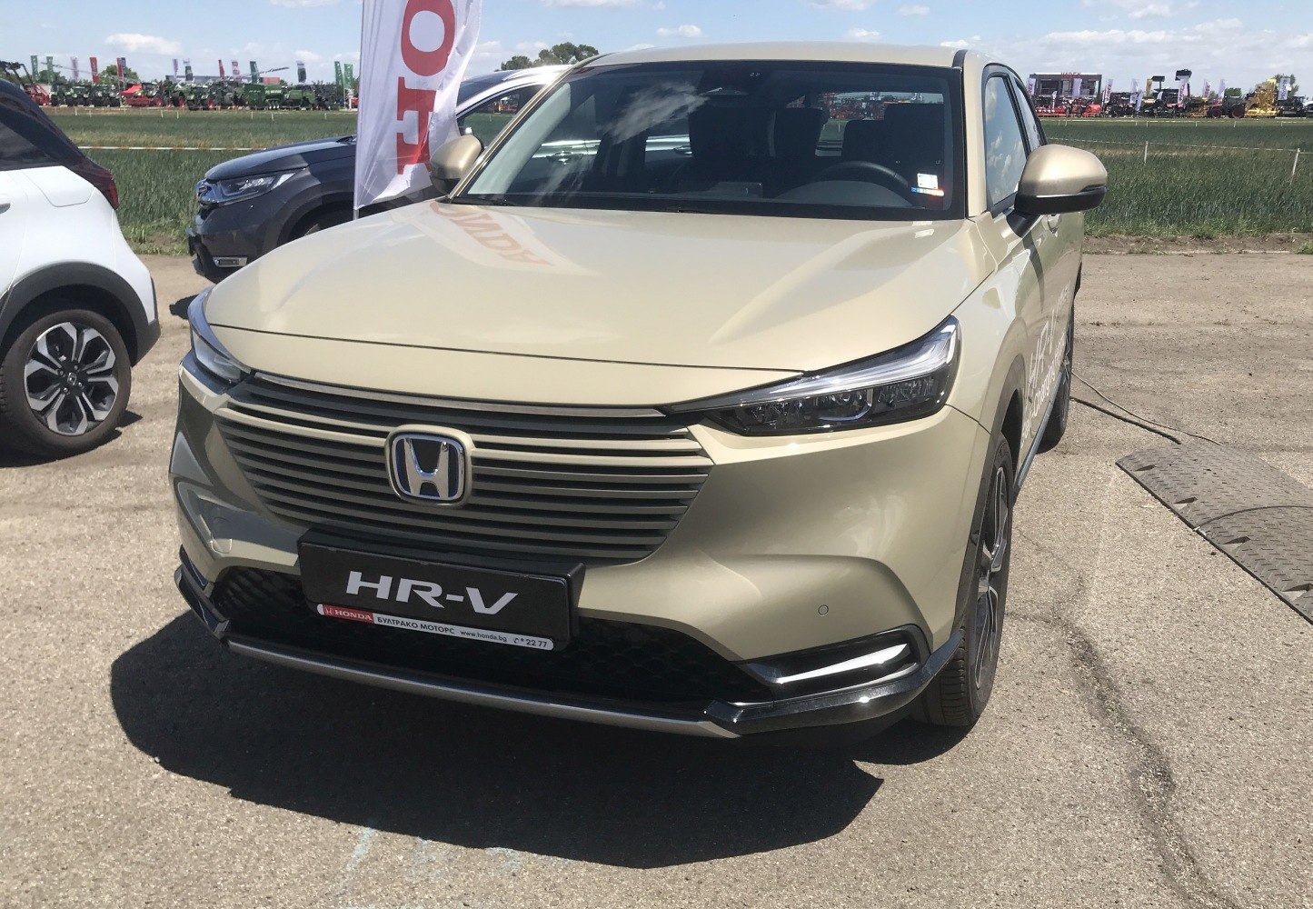 Front view with horizontal grille and sleek LED headlights