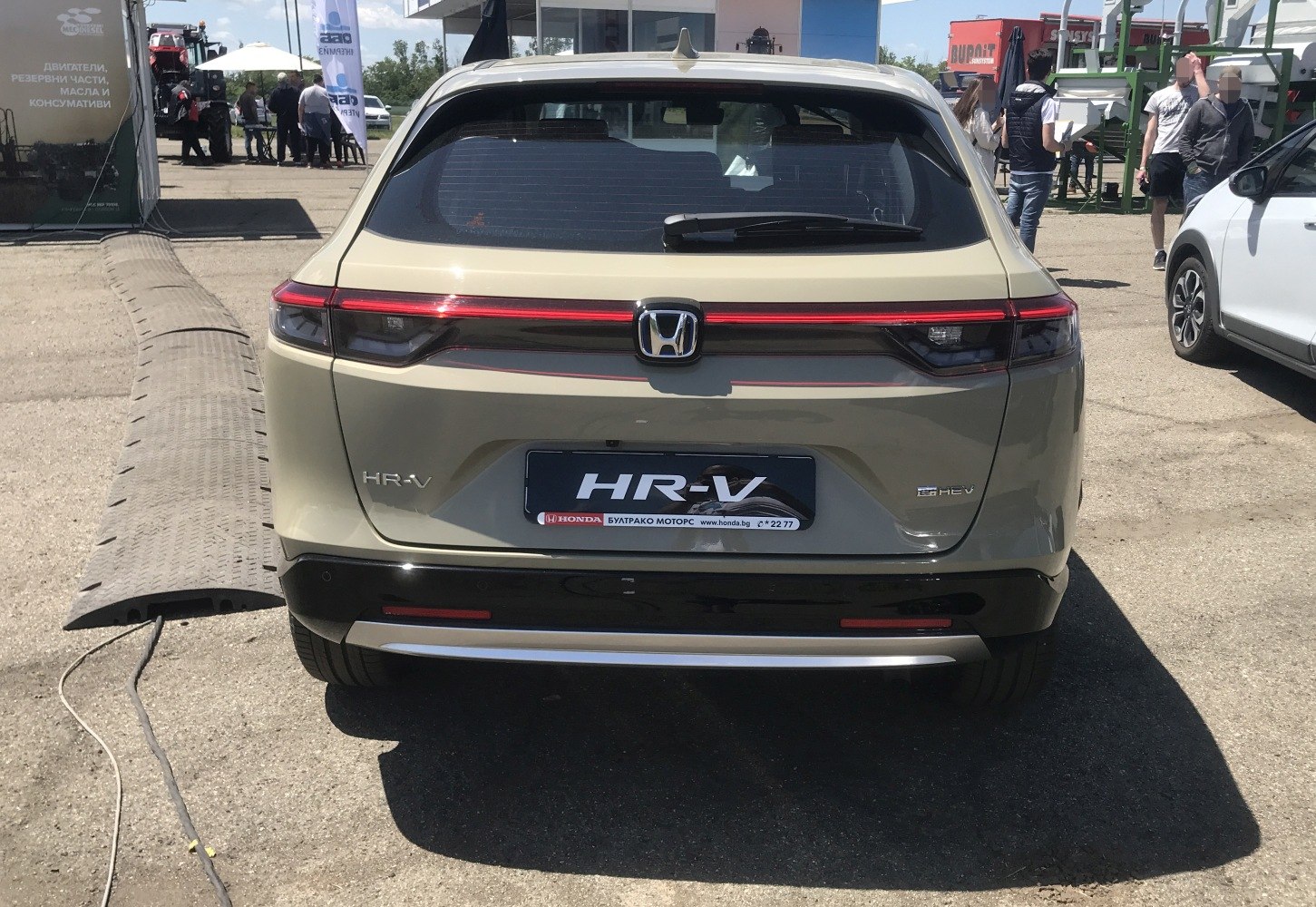 Rear view with LED tail light bar and hybrid badge