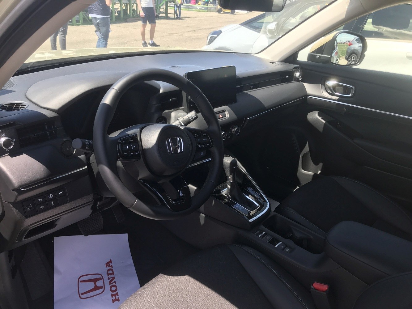 Modern interior dashboard with touchscreen and multifunction steering wheel