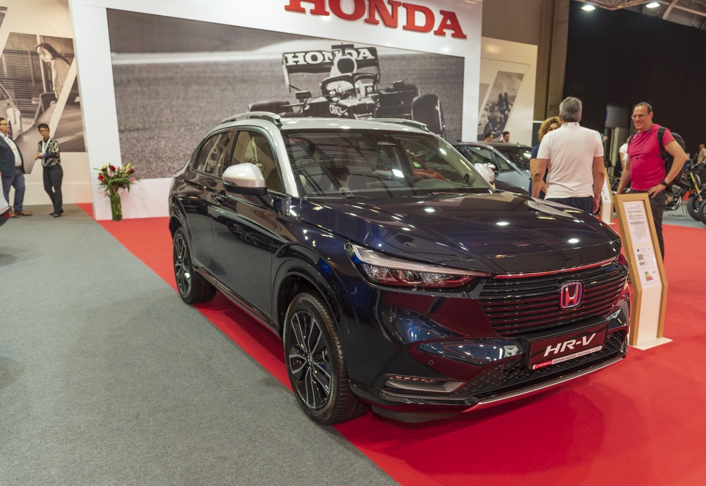 Front side view with LED headlights and grille