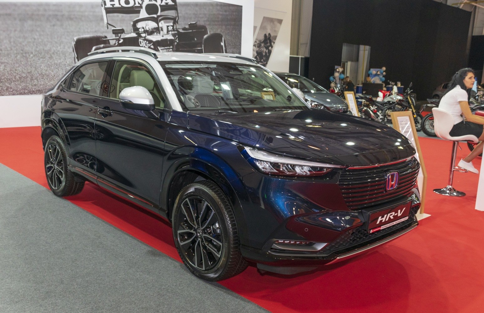 Sleek front view with LED headlights and black alloy wheels