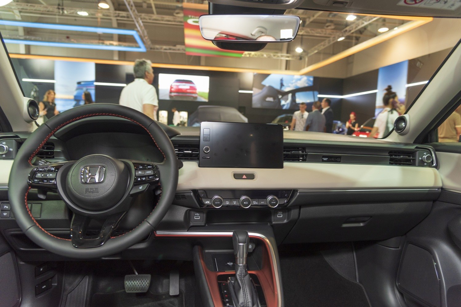Interior dashboard and steering wheel with infotainment screen