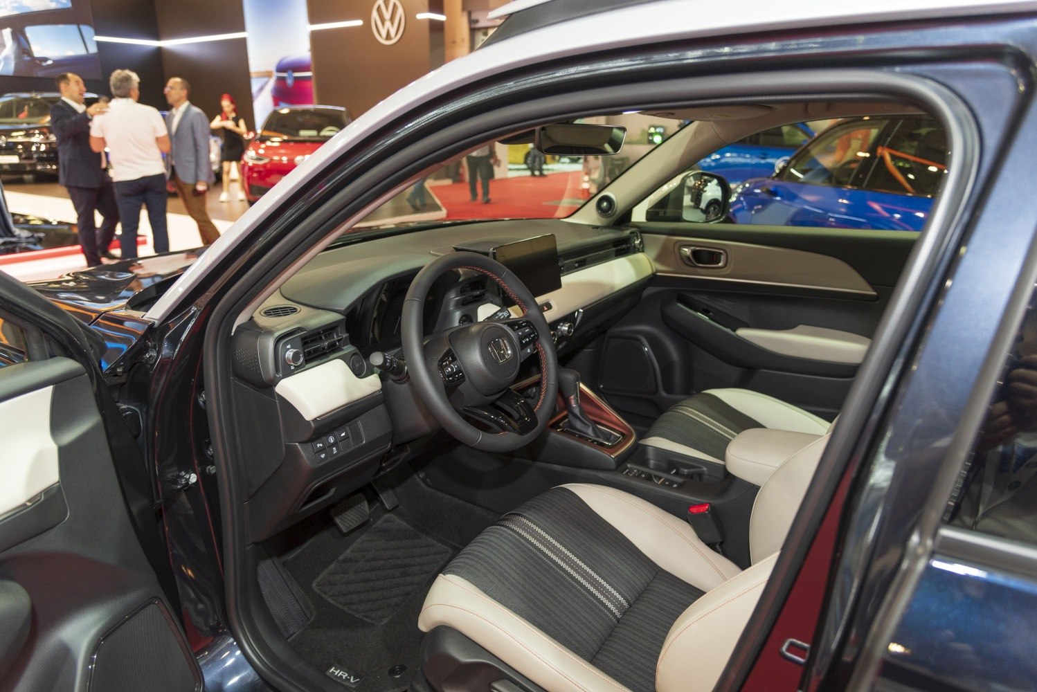 Modern dashboard and two-tone seats interior.