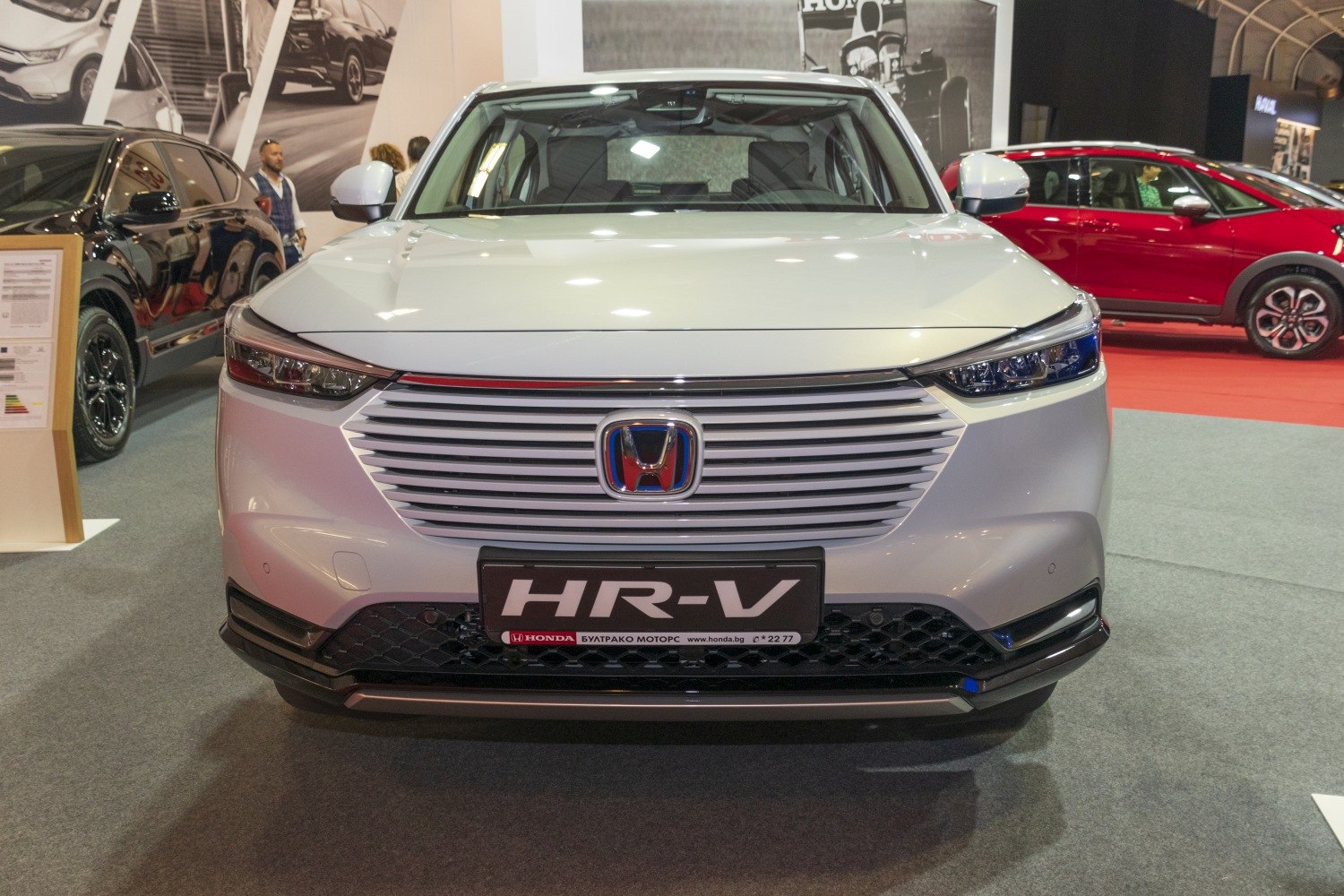 Horizontal grille with sleek LED headlights on 2021 HR-V III front