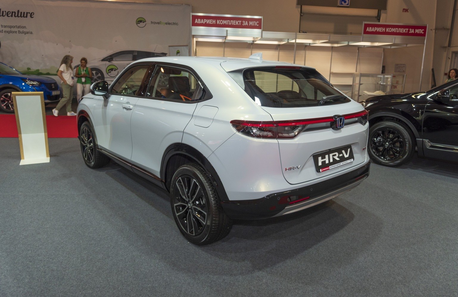 Rear view of a modern SUV with LED tail lights and sporty wheels