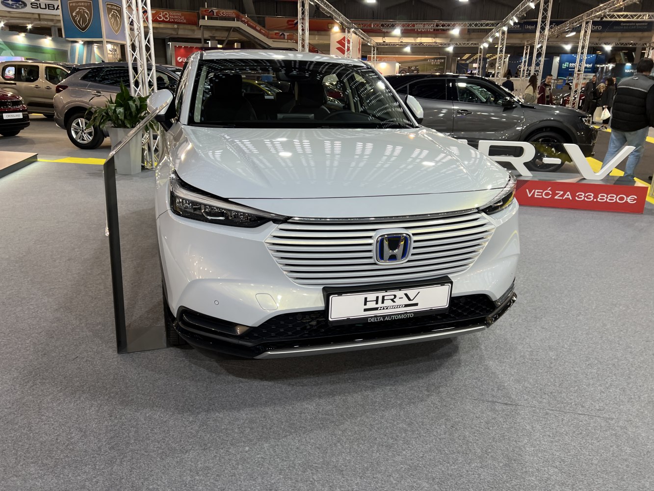 Front grille and LED headlights of modern hybrid SUV