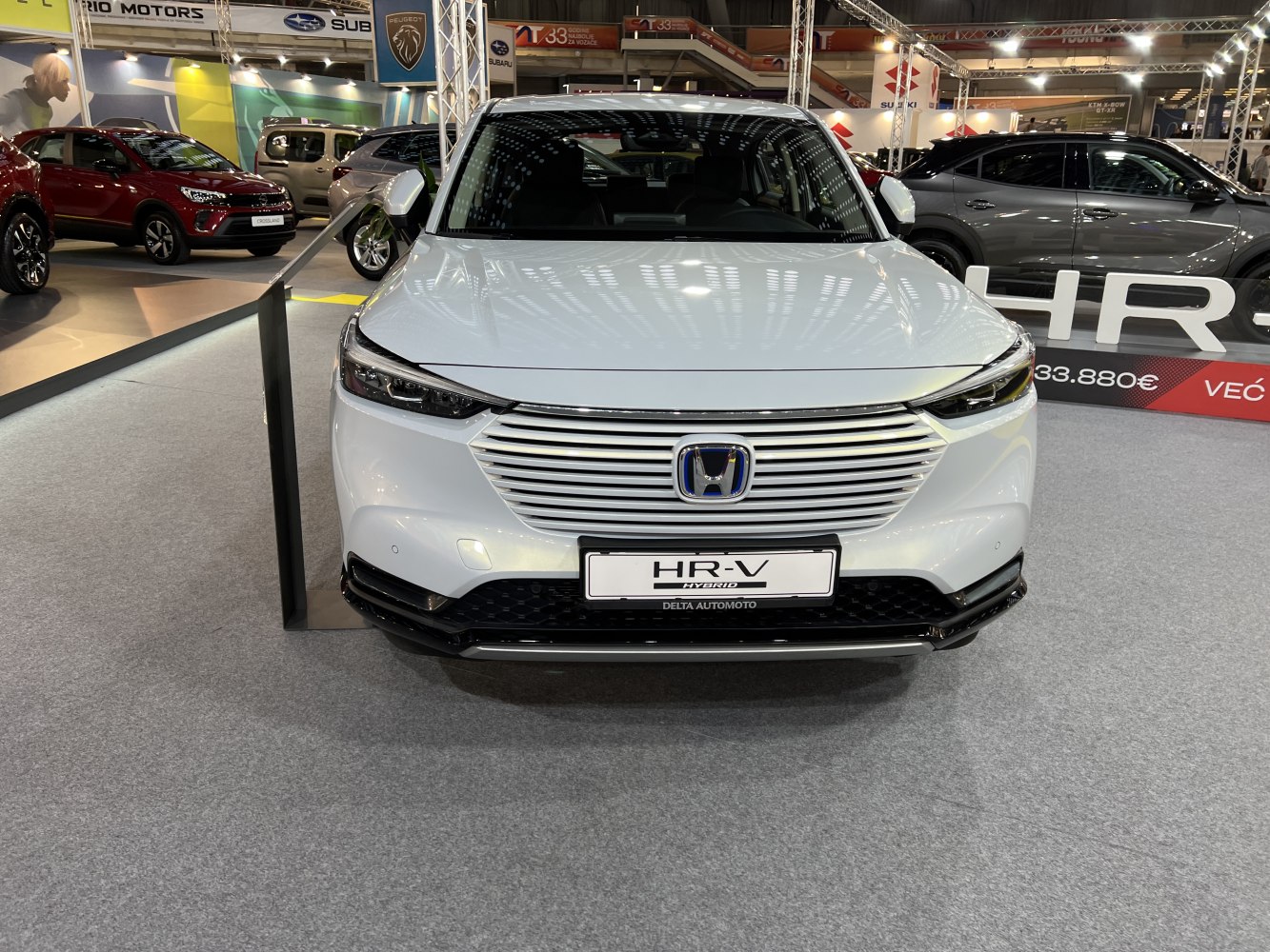 Front grille and LED headlights of a modern white SUV