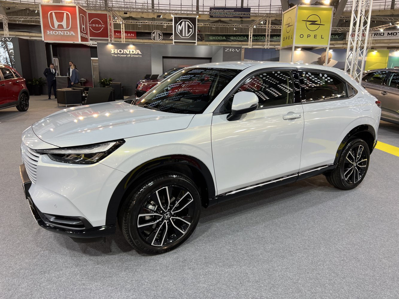 Modern SUV front side view with LED headlights and alloy wheels