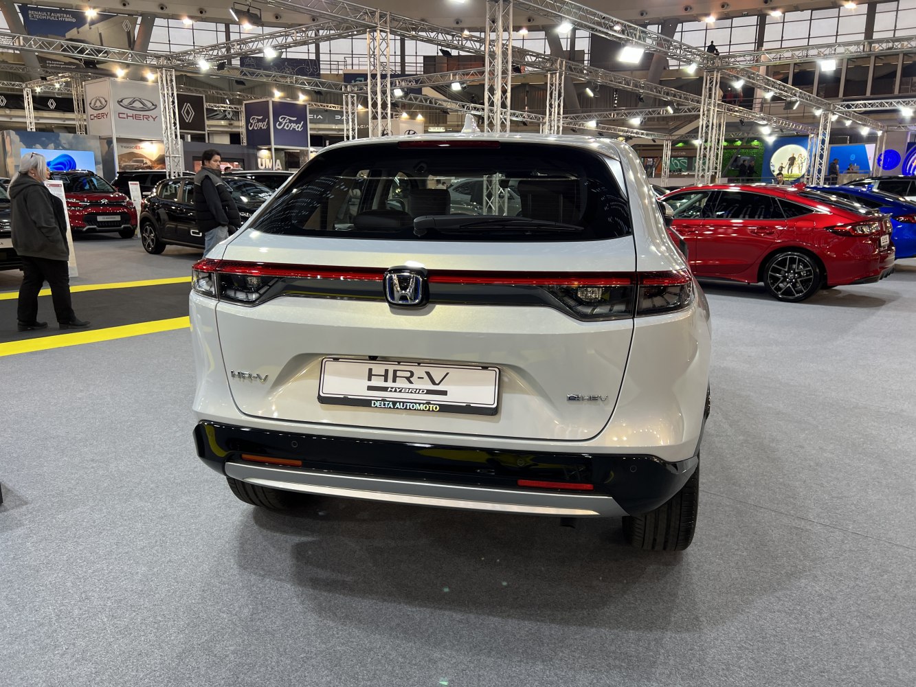 Rear view of hybrid SUV with modern taillight design.