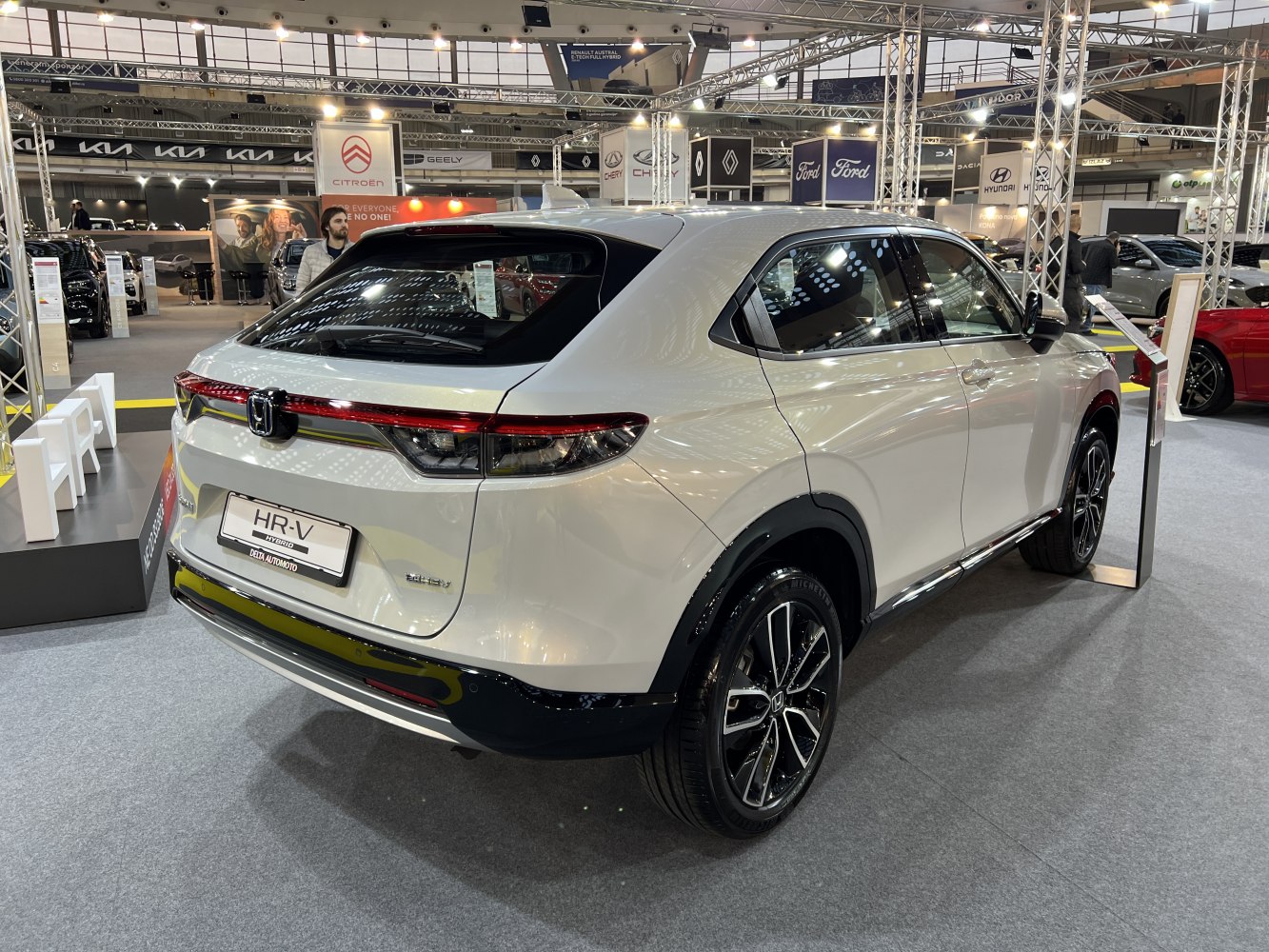 Rear view with sleek tail lights and alloy wheels