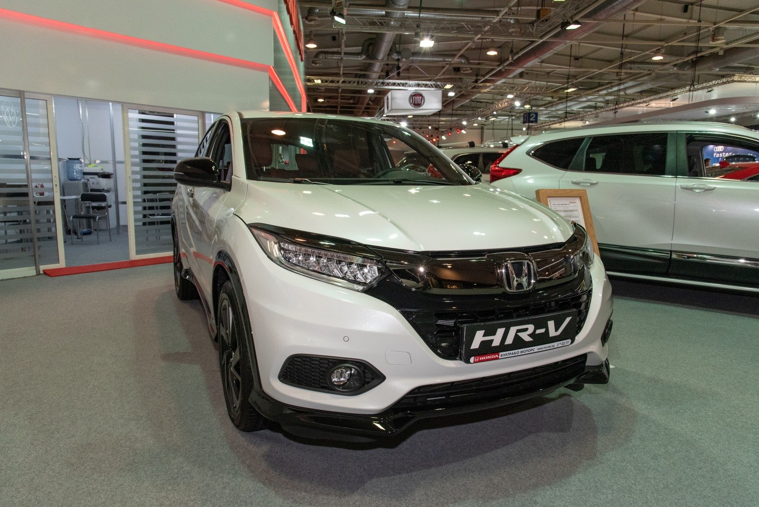Close-up of facelift 2018 front fascia with LED headlights and black grille.